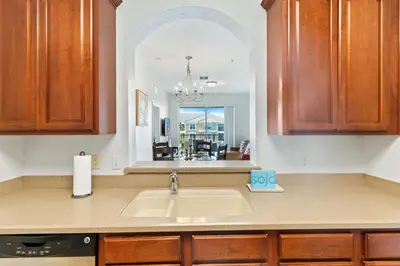 a kitchen counter with a sink and a window at 4814 Cayview Avenue 406 in Orlando