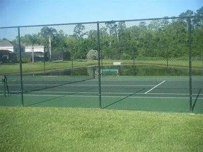 a tennis court with two tennis courts at LB4707AW 3 Bedroom Villa with pool and game room in Kissimmee