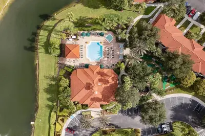 an overhead view of a house with a swimming pool at Lakeview w/8 Bedroom 5 KingSuite 3 miles to Disney in Kissimmee