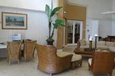 a living room with a couch and a table and chairs at Nice & Cozy - Vacation Home in Kissimmee