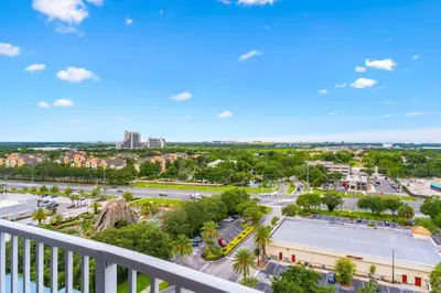 a view of a city from a balcony at Blue Heron Beach Resort in Orlando
