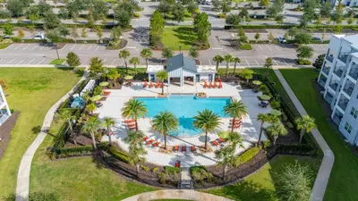 an overhead view of a pool at a resort at Magic Condo 3BR at Storey Lake – 10 min to Disney in Kissimmee