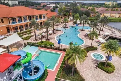 an image of a pool at a resort at AMAZING vacation house .Mins to Disney Regal oasks in Orlando