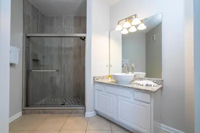 a bathroom with a sink and a shower at Location Location Orlando Resort Near All Parks! Int'l Dr in Orlando