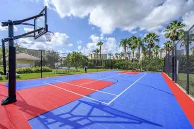 a basketball court with a basketball hoop at Location Location Orlando Resort Near All Parks! Int'l Dr in Orlando
