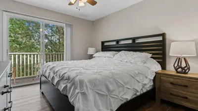 a bedroom with a large bed and a window at bsv_villa8445 in Kissimmee