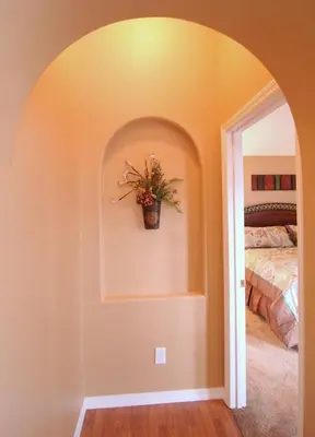 a bedroom with a bed and a potted plant on the wall at Emma Castle - private fenced home 3 miles to Disney in Kissimmee