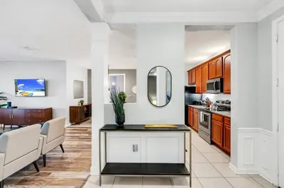 a kitchen with a table and a dining room at Vista Cay Magic condo in Orlando