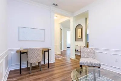 a dining room with a table and two chairs at Vista Cay Electra condo in Orlando