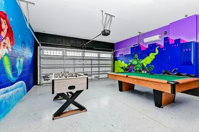 a room with a pool table and a mural at Enchanting Home Near Disney With Game And Themed Rooms With Waterpark & Resort Access At Encore Resorts Reunion - 7403Mr in Kissimmee