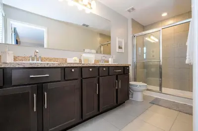 a bathroom with a sink and a shower and a toilet at Stunning 3Bd Close to Disney at Fiesta Key 4764 in Kissimmee