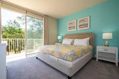 a bedroom with a bed and a large window at Marvelous 3Bd w Pool Near Disney at Serenity 1536 in Orlando