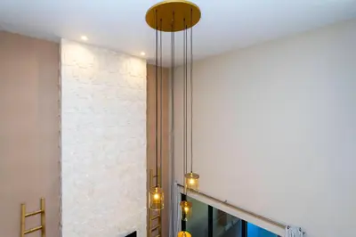 aendant light hanging from a ceiling in a room at Magical 4suites Home w jacuzzi near Disney 7497 in Orlando