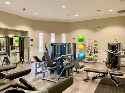 a gym with treadmills and cardio equipment in a room at Vista Cay - Cosy 3 bedroom condo in Orlando