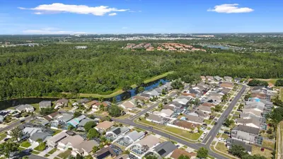 an aerial view of a residential suburb at Amazing Pool Spacious 3BR House near Disney in Kissimmee