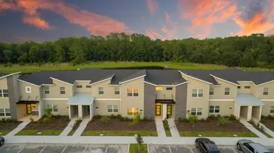 an aerial view of a apartment building with a parking lot at Marvelous 4Bd w Pool Close to Disney at Storey Lake 2629 in Kissimmee