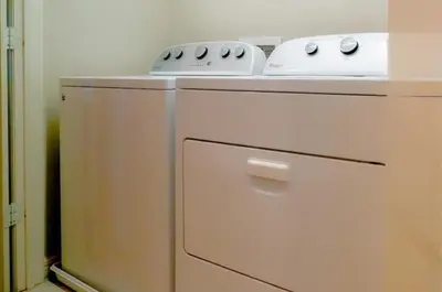a white stove top oven sitting in a kitchen at Vacation Home for 8, near Disney and Universal in Kissimmee