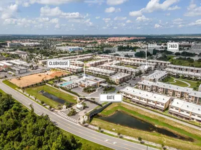 an aerial view of a city with buildings at 7594 Magic Village 3suites 6guets 8 min Disney in Orlando