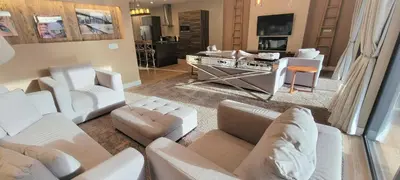 an aerial view of a living room with white furniture at 7594 Magic Village 3suites 6guets 8 min Disney in Orlando