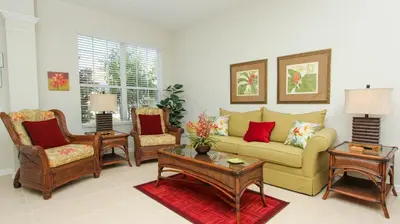 a living room with a couch and chairs at 2505 Archfeld in Kissimmee