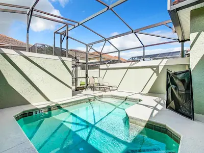 a swimming pool on top of a house at 8967 California Palm in Kissimmee