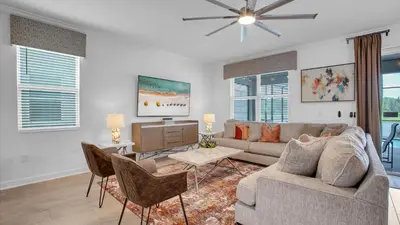 a living room with a couch and a table at 4169 Paragraph in Kissimmee