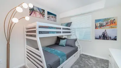 a bunk bed in a bedroom with a bunk bed in a room at 3151 Paradox #102 in Kissimmee