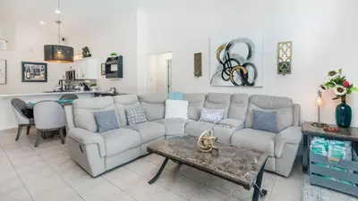 a living room with a couch and a table at 2787 Lido Key in Kissimmee