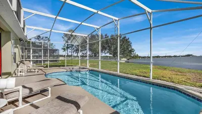an image of a swimming pool in a house at 8034 King Palm in Kissimmee