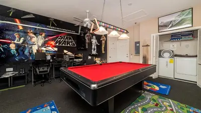 a room with a pool table in a classroom at 8136 Sun Palm in Kissimmee
