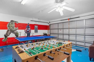 a game room with a table and ping pong balls at 201 Hideaway beach 4 beds - pool&spa in Kissimmee