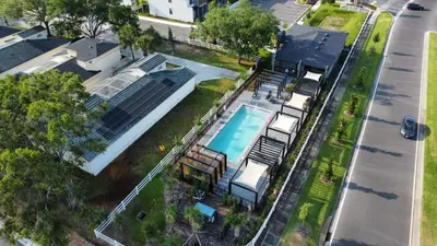 an aerial view of a house with a swimming pool at Marvelous 3Bd Close to Disney w GameRoom at The Hub 3409 in Kissimmee