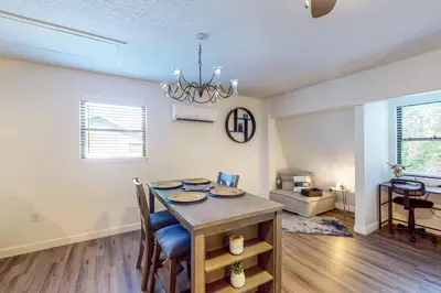 a dining room with a table and some chairs at Dog-Friendly Apt with Fenced Yard in Winter Park in Orlando
