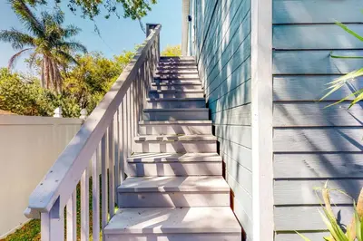 a set of stairs leading up to a building at Dog-Friendly Apt with Fenced Yard in Winter Park in Orlando