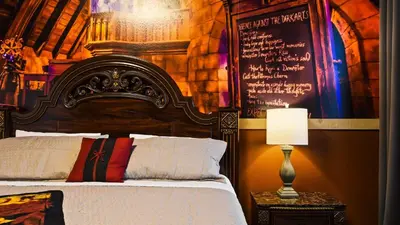a bedroom with a bed and a sign on the wall at Opulent Retreat, Pool & Lake View, Near Parks in Kissimmee