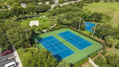 an overhead view of a tennis court at Home with Lakeview Close to Disney w Pool in Orlando