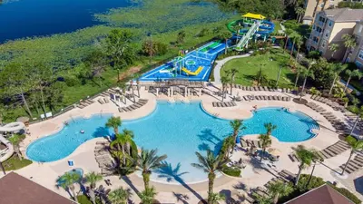 an aerial view of a water park at a resort at Home with Lakeview Close to Disney w Pool in Orlando