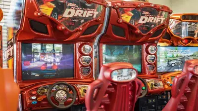 a bunch of video games on a pinball machine at Home with Lakeview Close to Disney w Pool in Orlando