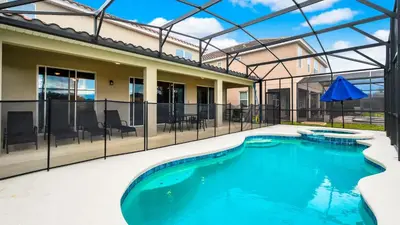a swimming pool in the backyard of a house at Veranda Palms Lakeview 6br Villa Pool Spa, Disney in Kissimmee
