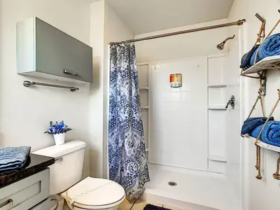 a bathroom with a toilet and a shower at 3 Bedroom Townhome Close to Disney in Kissimmee