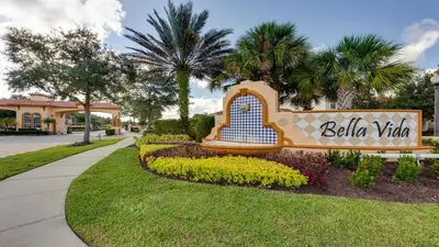 a sign at the entrance to a resort at Game Room 12BR Kids World Pool Spa Near Disney in Kissimmee