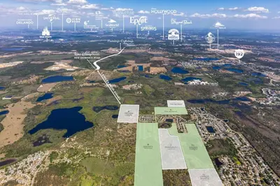 an aerial view of a city with buildings and water at 3 bedrooms pool home Retreat Close to Disney in Orlando