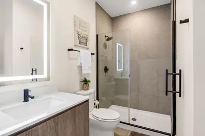 a bathroom with a toilet sink and a shower at TR17126 - 3 Bed-3 bath w/pool near Disney sleeps 6 in Orlando