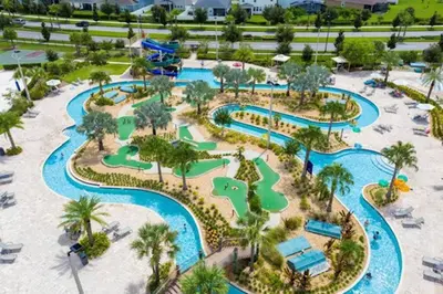an aerial view of a water park at a resort at Amazing Unbeatable Experience Themed Home w/ Private Pool and Resort in Kissimmee