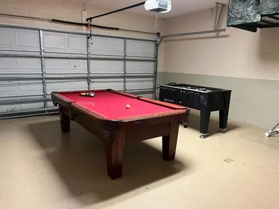a room with a pool table and a garage at S890SB - 12 guests - 6 beds in Kissimmee
