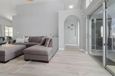 a living room with a couch and a chair at IC8090ICB - Indian Creek Oasis in Kissimmee