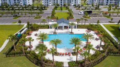 an aerial view of a pool at a resort at Strategic Condo 2 Bd Close to Disney Storey Lake in Kissimmee