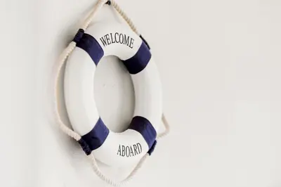 a blue and white wreath hanging on a wall at Lakeview Family Haven in Kissimmee - Pool & Scenic Views in Kissimmee