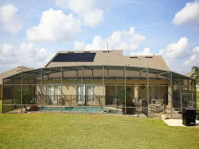 a large house with a lot of windows at Princess Hideaway in Orlando
