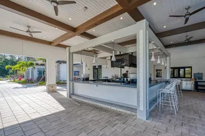 an open kitchen and dining area of a house at Charming Mickey-Themed Home Prime Location in Kissimmee